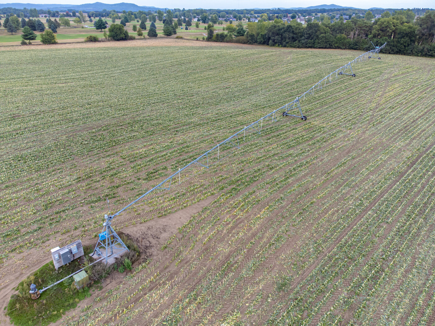 A center-pivot irrigation line across a field